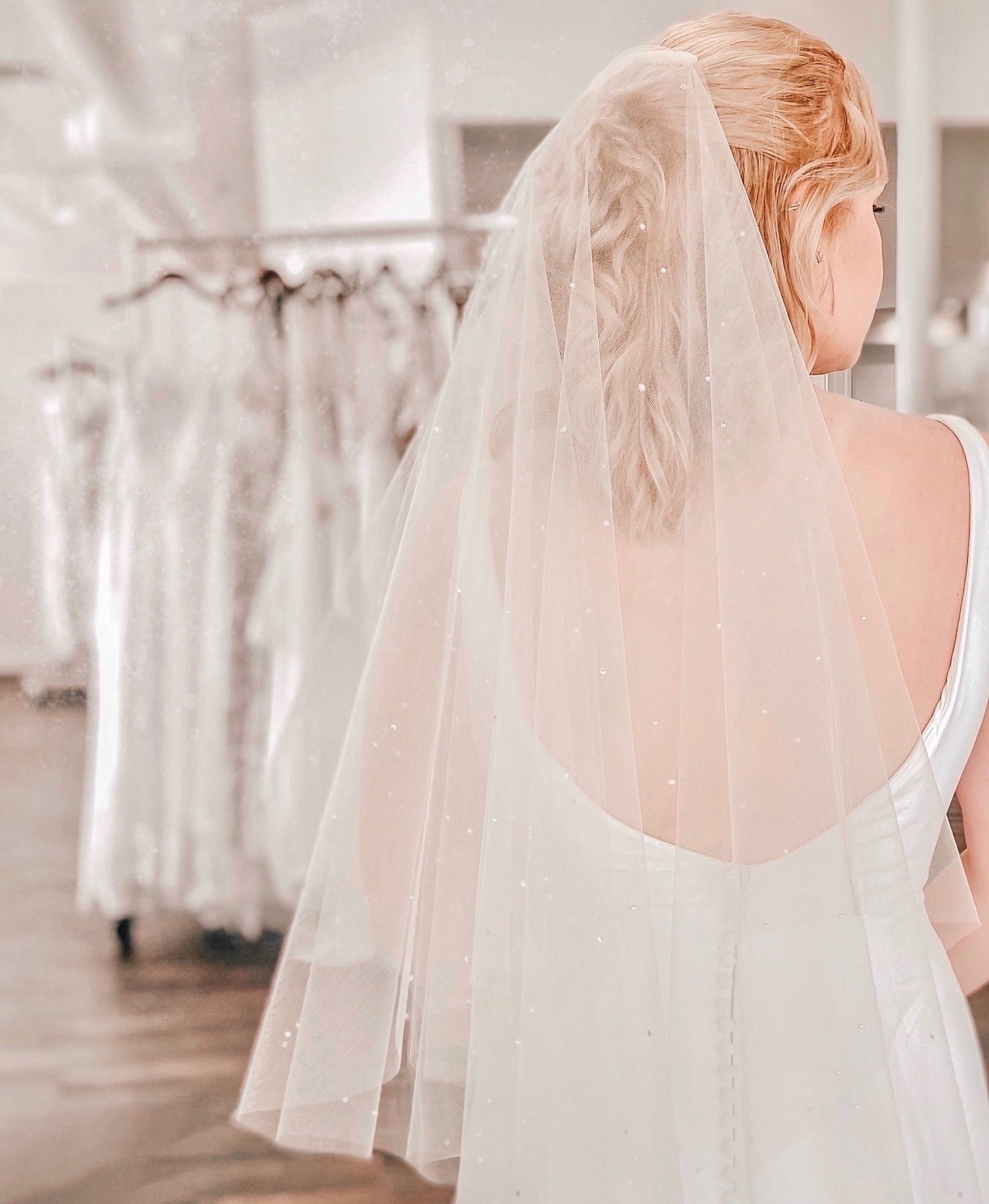 pearl veil on a wedding dress