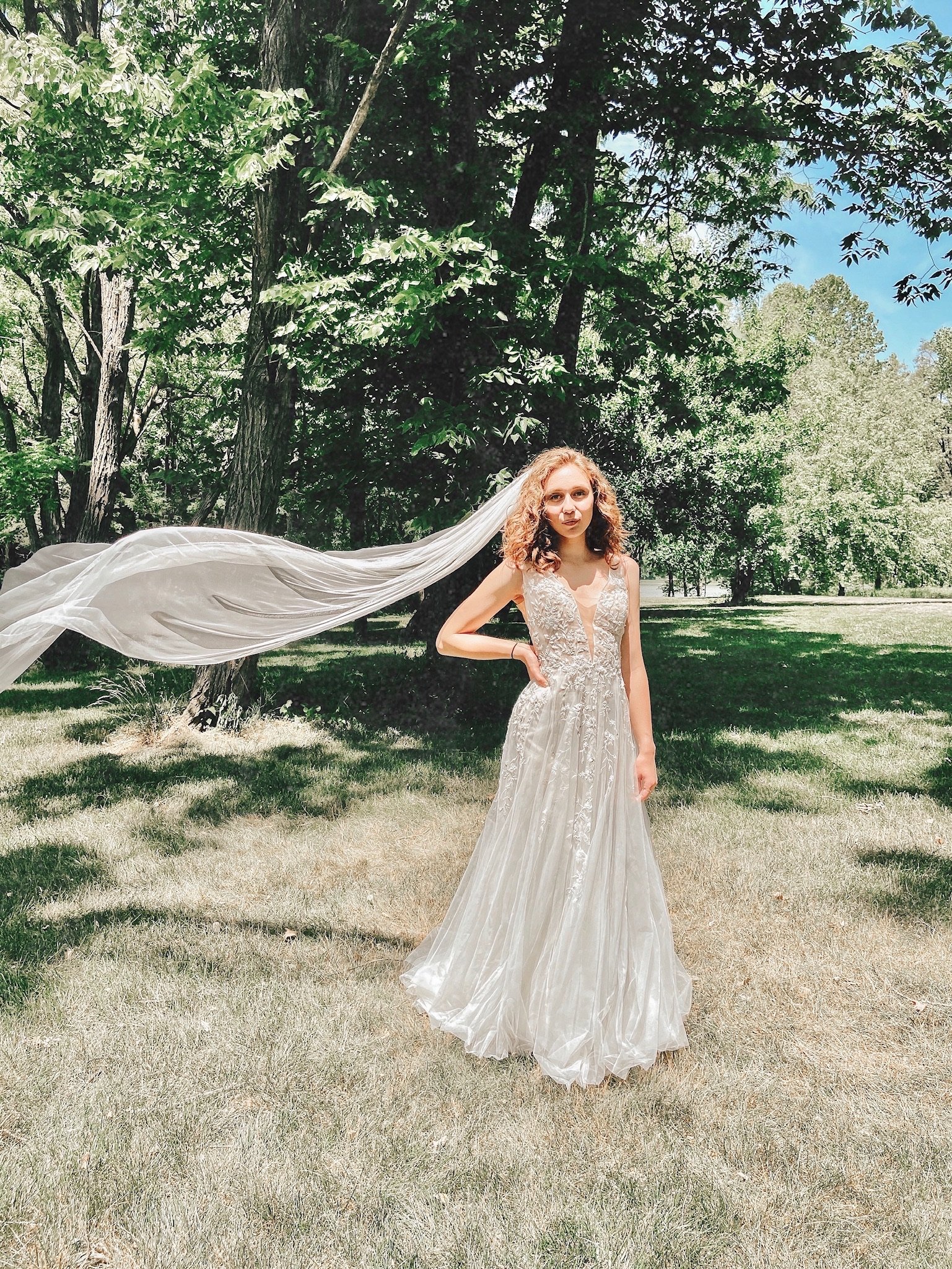 wedding photos at the Indianapolis Museum of Art with a veil flowing in the wind