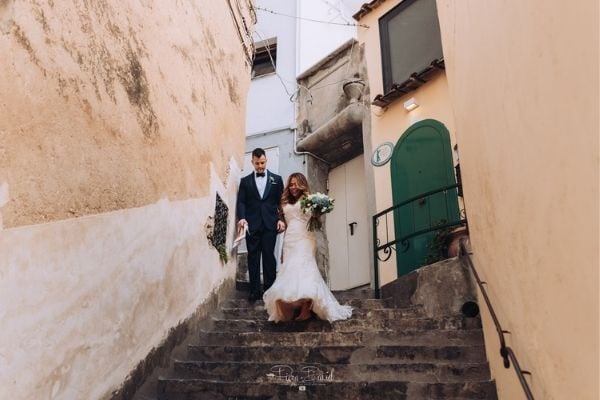 walking down the stairs on wedding day