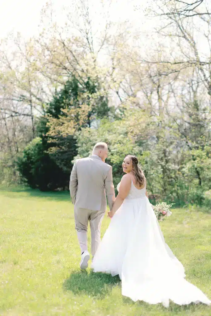 Back Of Brides Dress With Long White Bustle