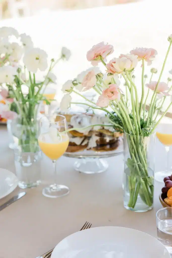 Pastel And White Flowers On Table For Bridal Brunch Table