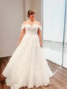 Bride To Be Admiring Dress In Southport Boutique