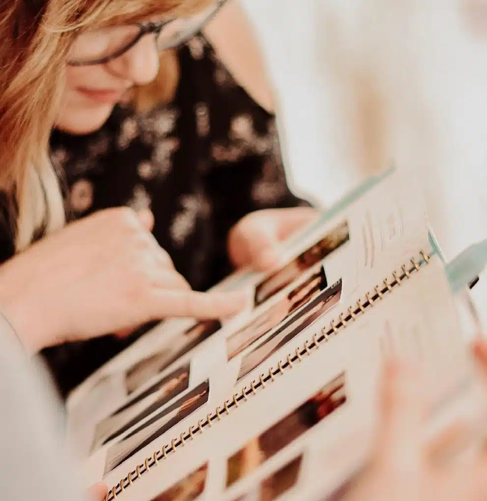 Close Up Of Women With Inspiration Wedding Scrapbook