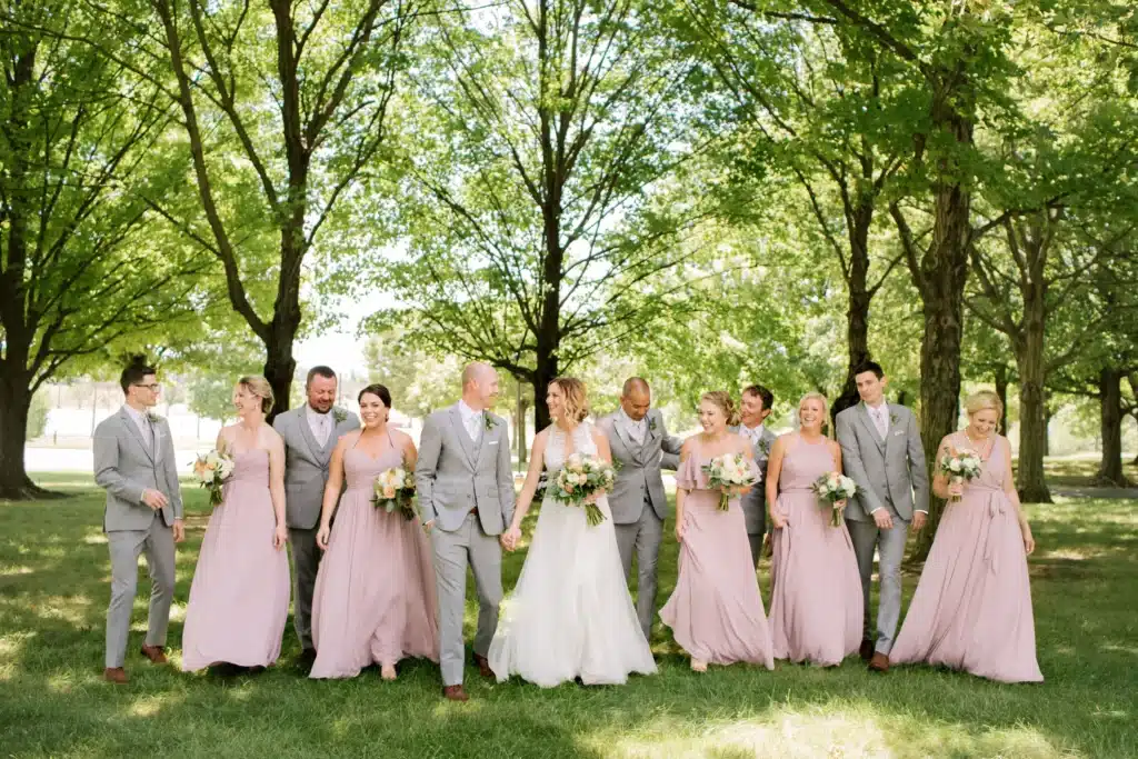 Color Coordinated Bridal Party With Bride And Groom