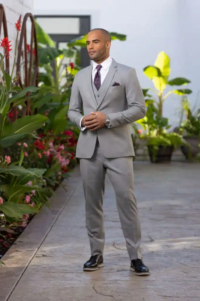 Groom In Grey And White Suit