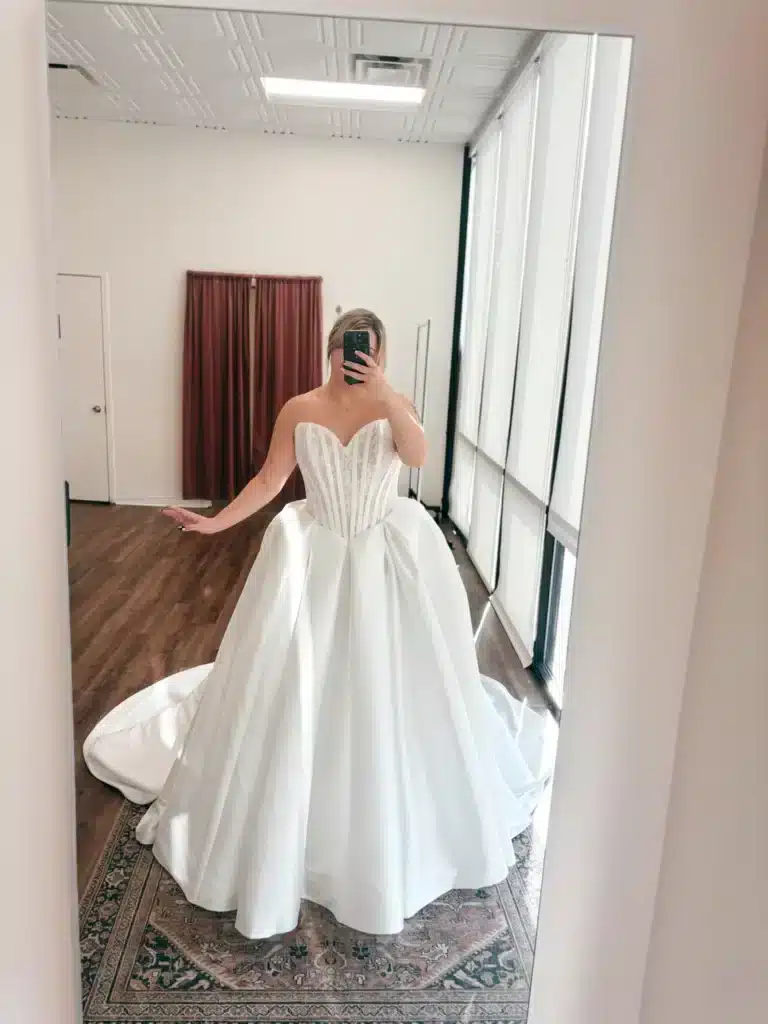 Women Taking Selfie In Ball Gown Wedding Dress