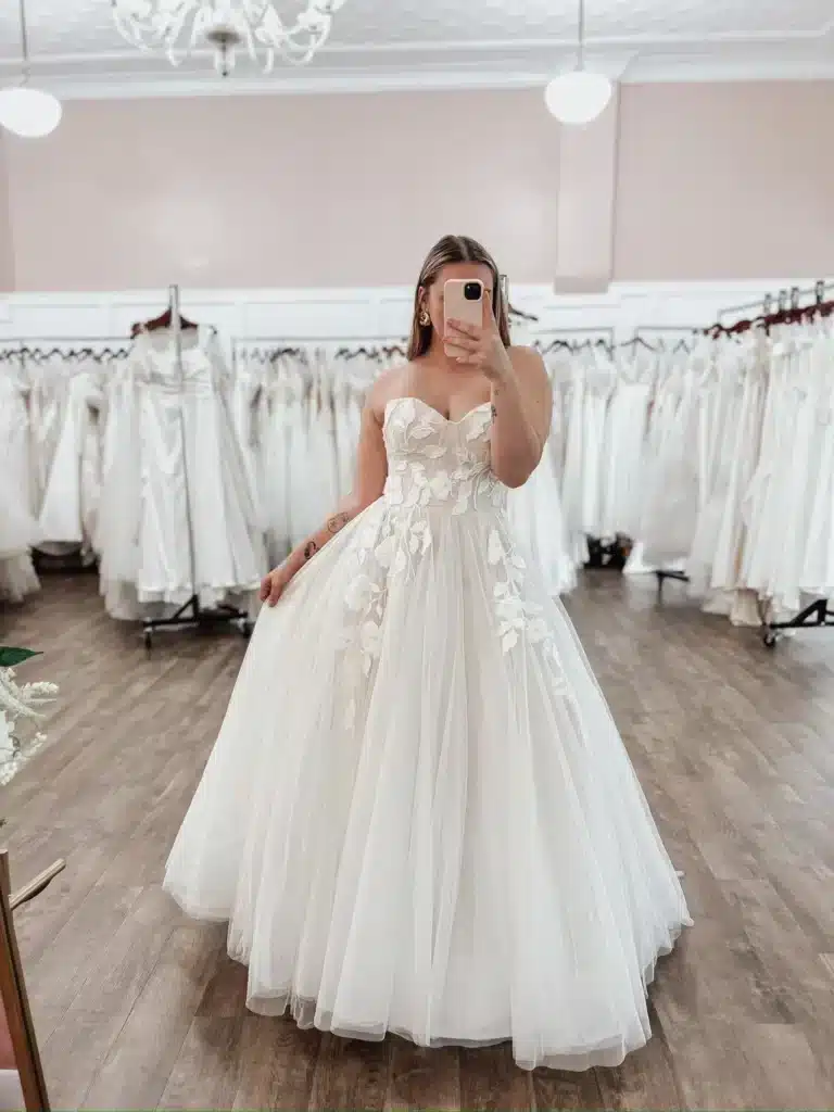 Women Taking Selfie In Weddng Dress For Beach Wedding