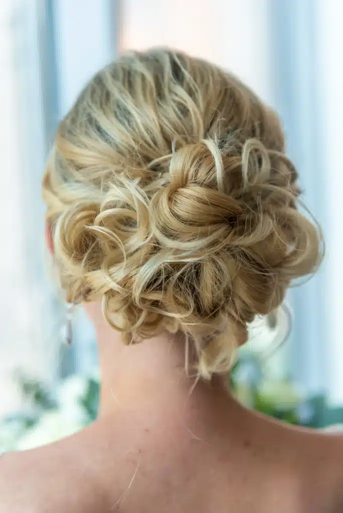 Chignon Hairstyle On Mother Of The Bride With Blonde Hair