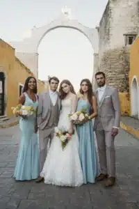 Photo Wedding Party Outdoors By Stone Archway