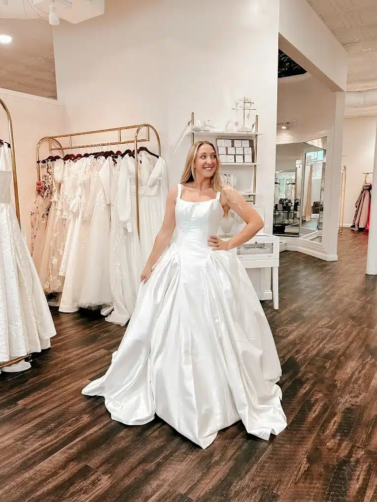 Bride Trying On Wedding Dress At Sophias Bridal And Tux