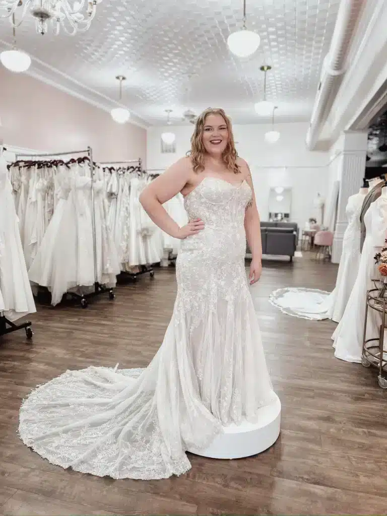 Bride To Be Posing In Lace Fit And Flare Sleeveless Wedding Dress