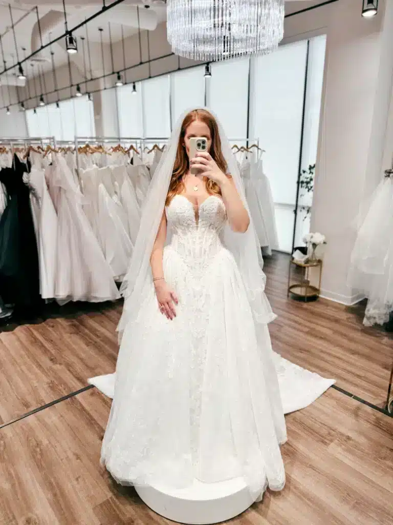 Bride Trying On Wedding Dress At Sophia's Louisville Location