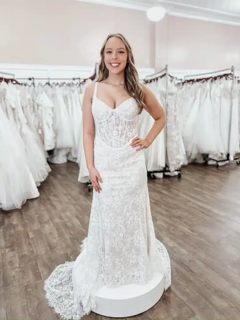 Bride Trying On Wedding Dresses In Columbus Indiana At Sophia's Bridal