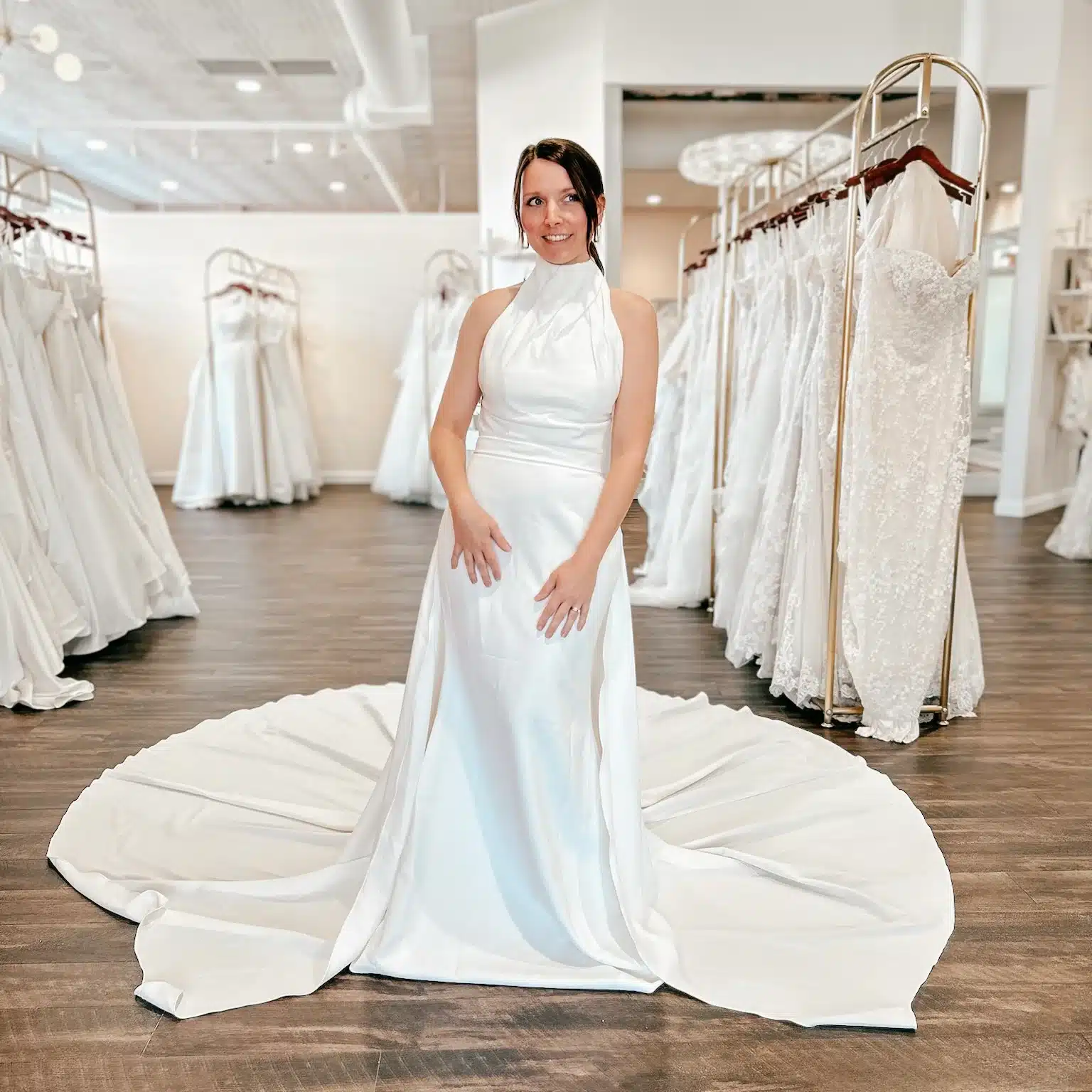 Bride Trying On Wedding Dress In Louisville With Halter Neckline Bride Trying On Wedding Dress In Louisville With Halter Neckline