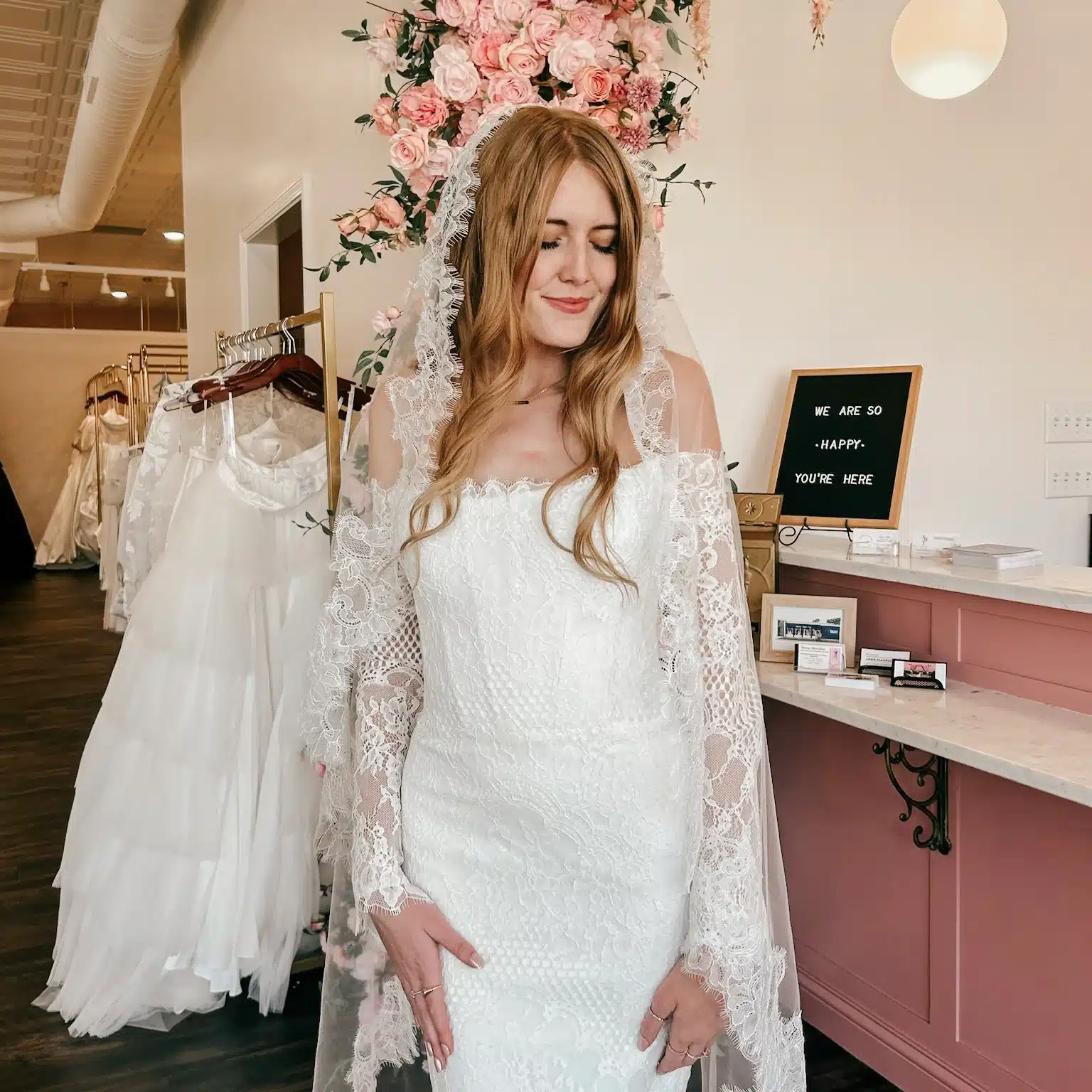 Close Up Of Lace Long Sleeve Wedding Dress With Lace Veil On Bride To Be Close Up Of Lace Long Sleeve Wedding Dress With Lace Veil On Bride To Be