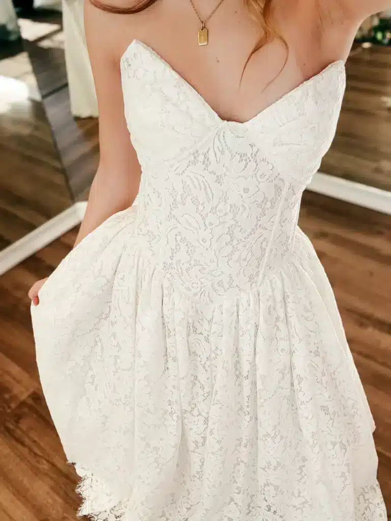Close Up Of What Is A Corset Wedding Dress On Bridal Client