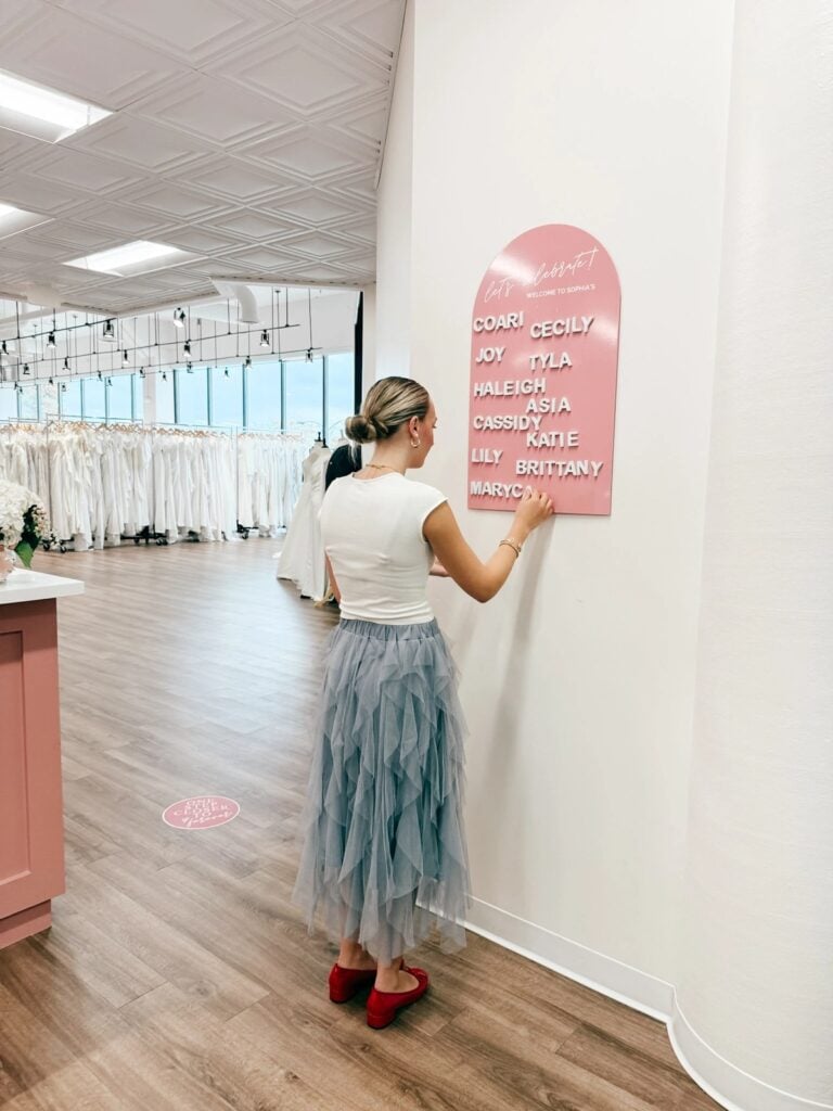 Bridal stylist preparing for wedding dress appointments at Sophia’s