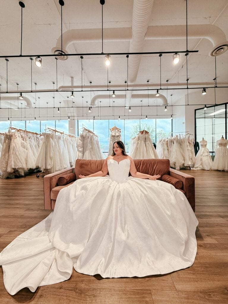 Bride trying on a ballgown wedding dress at Sophia’s Bridal & Tux